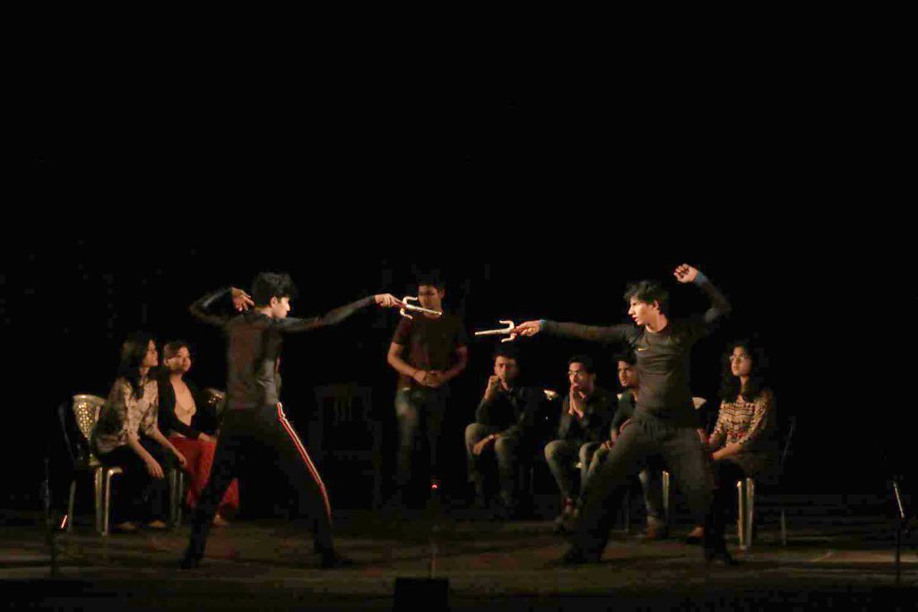 Last scene - the fight between Laertes (left) and Hamlet (right) with others watching.